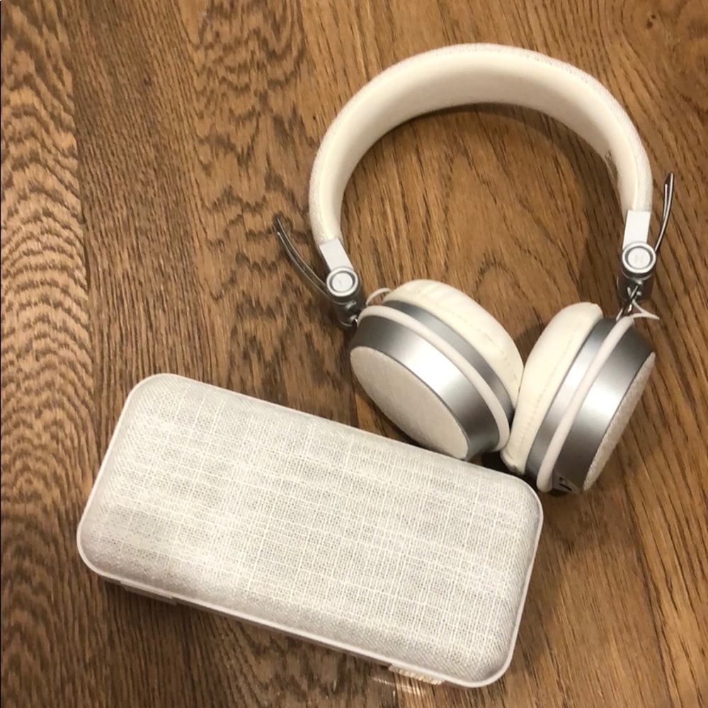 BLUETOOTH HEADPHONES AND SPEAKER SHARPER IMAGE